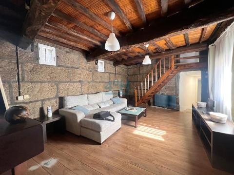 Planta Baja: Salón-comedor con chimenea